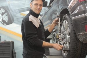 man changing a tire